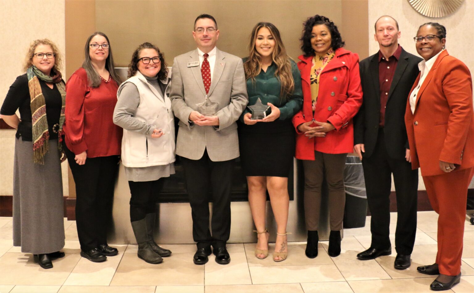 Members of the Oklahoma Housing Finance Agency homeownership department congratulate 2022 Leading Light Lending Partner award recipients. Pictured, from left, Angie Thies, OHFA homeownership specialist; Kristina Nichols, OHFA homeownership supervisor; Barb Yeary, Stride Bank business development manager; Bryan Carroll, First United Bank & Trust mortgage lending consultant; Yahaira Velasco, Associated Mortgage Corporation mortgage loan officer; Stephanie Hollier, OHFA homeownership specialist; Daniel Truitt, OHFA homeownership specialist; and Valenthia Doolin, OHFA homeownership director.