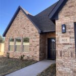 A brick home in the Courts of Montevino neighborhood.