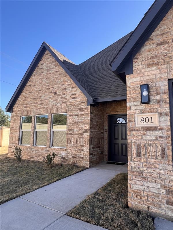 A brick home in the Courts of Montevino neighborhood.
